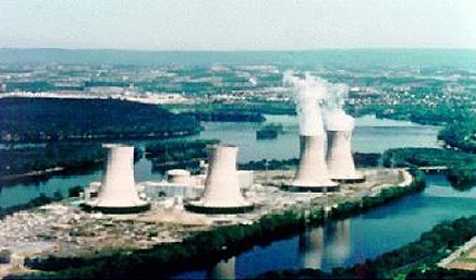 Photograph of Three Mile Island nuclear power plant located in Middletown, Pennsylvania, a few miles south of Harrisburg, the state capital. On March 28, 1979, the worst commercial nuclear disaster in U. S. history occurred when a pump failed in the reactor cooling system. Nearly a million gallons of radioactive water escaped through an open valve onto the reactor building basement floor. Radioactivity was also released into the air. Photograph courtesy U. S. Nuclear Regulatory Commission.