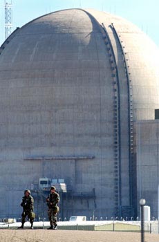 Armed National Guard troops at the Palo Verde, Arizona nuclear power plant 55 miles west of Phoenix on March 20, 2003, after notice of possible terrorist threat. Photograph © 2003 by The Associated Press.