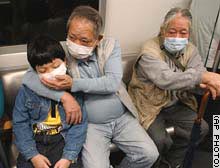 Health officials in China are seeing the SARS  virus infect people of all ages, and kill even the young and healthy. Photograph © 2003 by Associated Press.