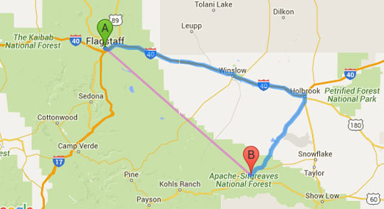 The straight purple line is 82 miles as the crow flies from (A) Flagstaff to (B) Heber in the Apache-Sitgreaves National Forest. It is 92 miles from Flagstaff to Holbrook near the Petrified Forest National Park.