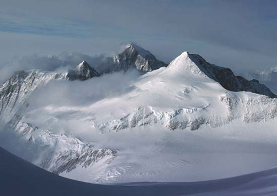 The Transantarctic Mountains are one of the longest mountain chains in the world extending for 3,000 miles from Coats Land to the Ross Sea where the U. S. McMurdo Station and Victoria Land are on the Ross Sea. Image by USGS.