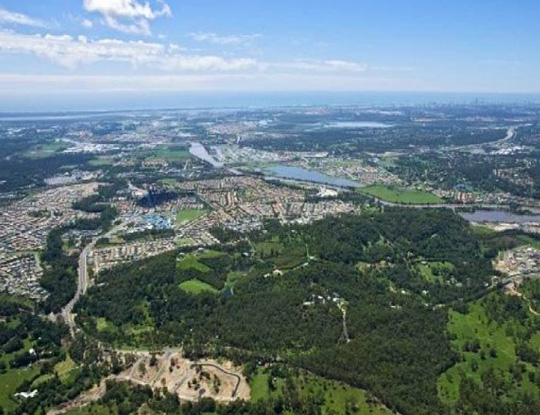 Aerial above the Gold Coast, Queensland, Australia, suburb of Upper Coomera, Wikipedia.