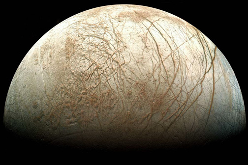 The icy surface of Europa is cracked like an egg from the tug and pull of Jupiter's gravitational stretching. Below the ice is a 62-miles-deep liquid water ocean and new data indicates more oxygen than expected reaches that ocean from the icy surface. Water plus oxygen could mean life there right now. Image from Galileo spacecraft, 1995 - 2003, by JPL, NASA and Ted Stryk.