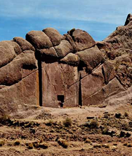 The door carved in the solid rock wall known as Aramu Muru is 23 feet high. The location is on the southwestern edge of Lake Titicaca, Peru, nearthe Bolivian border. The local native Indians say it is “Puerta de Hayu Marca," a gateway to the lands of the Gods and immortal life. Sometimes those who have gone through the doorway return with their “gods to inspect all lands in the kingdom” through the Aramu Muru door. Image by Ancient-Wisdom.com.