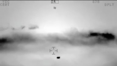 Infrared video frame of dark UFO, November 11, 2014. This and all infrared videotape frames below are © 2014 by Chilean CEFAA, which investigates UFOs.