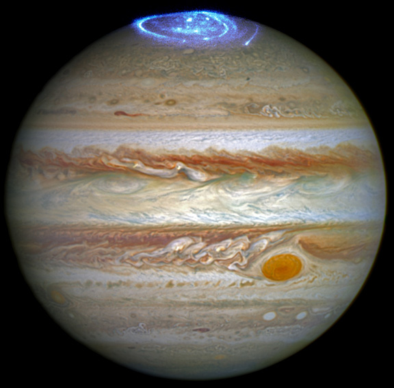 NASA Hubble Space Telescope image of Jupiter and blue aurora at the massive gas planet's poles. Jupiter is composed primarily of gaseous and liquid matter and is the largest planet in our solar system with a diameter of 88,846 miles (142,984 km) at its equator, which is eleven times the size of Earth's equatorial diameter of 7,917.5 miles (12,756 km). Credit: 2016 NASA, ESA, J. Nichols, Univ. of Leicester.