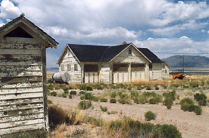 Peeling paint and boarded up DRES buildings. July 17, 2005 photograph © by Linda Moulton Howe.