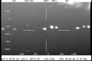 At 5:07:05 p.m. local time on March 5, 2004, at least eleven objects, small and large, show up on "white hot" polarity of FLIR camera.