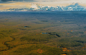 September 26, 2012, aerial of anomalous “green square” (red circle) with surrounding creeks that includes Highpower Creek and Mount McKinley to the southeast. Image © 2012 for Earthfiles by Frank Flavin.