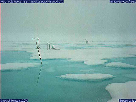 Melting North Pole photographed by NOAA NetCam#1, on July 15, 2004, at 4:45 UTC. Internal temperature was 12 degrees Celsius (about 54 degrees Fahrenheit). Image © 2004 by NOAA/PMEL.