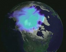 Aurora borealis glows in the atmosphere above the Arctic. The winter of 1999 to 2000, NASA and a European Commission measured the largest ozone depletion, a 60% loss, at 11 miles above the North Polar region. That was greater deterioration in the Arctic than observed during the previous ten years. Image of Arctic region courtesy of National Oceanic and Atmospheric Administration (NOAA).