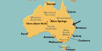 Black arrow points to Conondale valley region that is small dairy farming community a couple hours by car northwest of Brisbane, Queensland, Australia. 