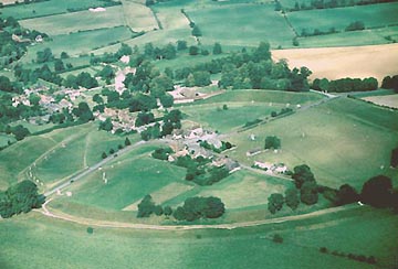 Avebury stone circle, largest in Europe, estimated to be more than 4,000 years old. Thirty witnesses at the Red Lion Pub in Avebury, Wiltshire, England, reported a rotating disk hovered about 200 feet above the center of the Avebury stone circle at twilight around 9:45 p.m. on Saturday evening, August 16, 2003. Aerial photograph © 2003 by Bert Janssen.