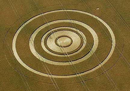Thin ring with small satellite exactly in the spot of an ancient burial mound, similar to the thin outer ring that touched small barrow satellite at West Stowell (Huish). Aerial photograph © 2003 by Nick Nicholas and Cropcircleconnector.com.