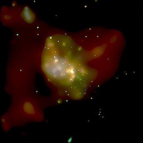 This false-color image from the Chandra X-Ray Observatory shows a central region of our Milky Way Galaxy about 24,000 light years from Earth known as Sagittarius A+. The bright, white central light source was produced by a huge X-ray flare thought to have occurred near a black hole at the center of our galaxy approximately 93 million miles in diameter. Chandra X-ray image courtesy NASA/MIT/F. Baganoff et al.