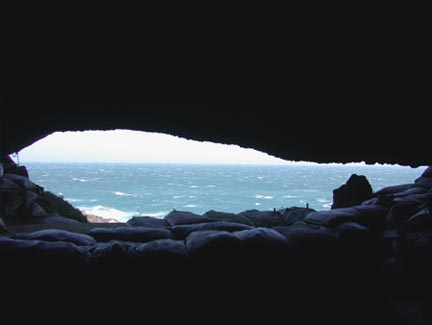 View looking out of Blombos Cave two hundred miles east of Cape Town at the tip of South Africa where the Atlantic and Indian Oceans come together. Photograph © 2001 by Christopher S. Henshilwood, Ph.D. 