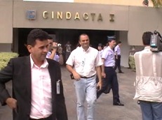 Top: Urandir Oliveira in left foreground at Brazil's CINDACTA I headquarters in the country's capitol, Brasilia, on Friday, May 20, 2005. Bottom: Brazilian Air Force officials announced release of UFO files to public. Photographs © 2005 by Felipe Branco.