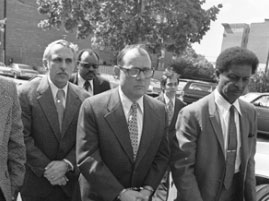 The DNC burglars were led off in handcuffs on June 17, 1972, after their arrest for breaking into the Democratic National Committee headquarters at the Watergate complex near the Potomac River. Three of those arrested were Cuban exiles, one was a Cuban-American and their on-site leader was James McCord, a former CIA agent and a security coordinator for President Richard Nixon's Committee for the Reelection of the President (CREEP). Photo © 1972 by AP.