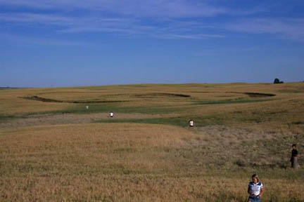 High River, Alberta, Canada, ringed circle, reported August 28, 2005. Redness in upper right of photo below unidentified. Photographs above and below © 2005 by Doug & Wendy Kennedy.