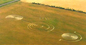 Large pictogram measured at 439 feet in length reported in Revenue, Saskatchewan on August 8, 2003 in wheat. Aerial photograph © 2003 by Brent Latumus.