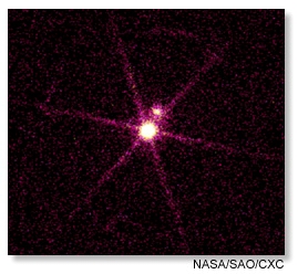 Stars Sirius A and B, a Chandra x-ray image courtesy NASA and Harvard-Smithsonian Astrophysical Observatory.