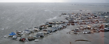 Superstorm Hurricane Sandy on October 29, 2012, killed more than 100 people and caused at least $71 billion in damages in New York and New Jersey, including 72,000 houses and buildings in New Jersey alone, such as these flooded homes in Tuckerton, N.J. Image courtesy US Coast Guard.