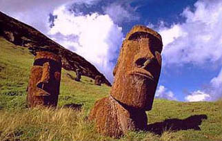 The statues of Rapa Nui on Easter Island are called moai in the Rapanui language. In the totem tradition of some other Polynesian cultures to honor ancestors and display strength and wealth, statues were carved from the island's lava stone between 900 A.D. and around 1500 A. D. Approximately half of the total of 887 statues documented to date still remain in the immediate vicinity of Rano Raraku, the quarry in which they were produced. The statues were transported and erected with the leverage help of the island's once abundant tall palm trees which were eventually all cut down. Photograph © Cliff Wassman.