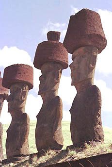 Over time, the statues became more elaborate with large, mysterious head dresses. Photograph © Cliff Wassman.