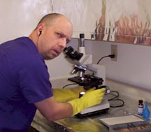 Danny B Burisch, Ph. D., Microbiologist, working in Las Vegas, Nevada in 2004. Photograph by BJ.