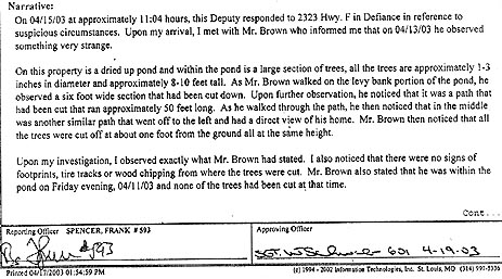 Excerpt from April 15, 2003, St. Charles County Sheriff's Department Offense/Incident Report about the T-shape cut in the saplings growing in the dry pond on the Arthur and Pat Brown property in Defiance, Missouri, discovered on Palm Sunday, April 13, 2003.