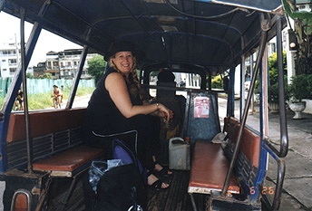 Denise Blazek, producer from South Perth, Australia in Vientiane taxi to scout stupa locations for Bang Productions Ltd. Photograph by Linda Moulton Howe.