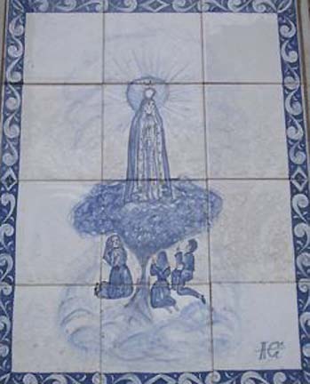 Tile work depicting the three children below the oak tree and the apparition with black eyes in 1917. Tile art by Ironbound, a Portuguese company in Newark, New Jersey.