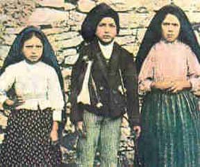 Jacinta Marto (age 7), Francisco Marto (age 9) and Lucia dos Santos (age 10), the three children of Fatima in 1917, the year they were witness to the small female apparition atop the oak tree.