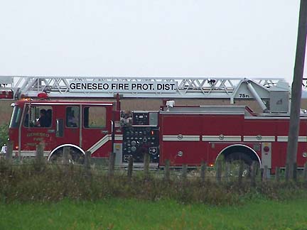 Geneseo Fire Protection District ladder truck parked on Middle Road next to the five circles in the Stahl soybean field around 11 a.m. CDT on Saturday, August 19, 2006.