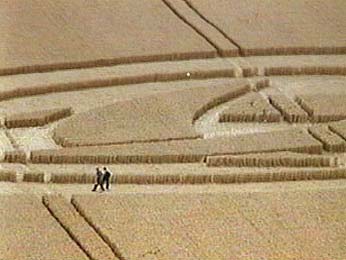 August 7, 1999, Barbury Castle, Wiltshire, England, wheat formation. Moving light on videotape (upper center of frame) was one of two rapidly moving objects seen by the photographer at the time. Videograph © 1999 by Donald Fletcher.