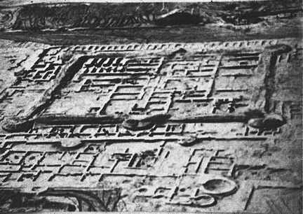 Large 150 meters by 150 meters fortified building complex dating to at least 1800 B. C. in the Kara Kum desert of Central Asia at Margiana, Turkmenistan (Russia) near Afghanistan border. Photograph courtesy Prof. Fredrik T. Hiebert, University of Pennsylvania.