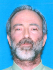 Is this the face of a “human-alien hybrid secret agent”? This is Jeffrey Alan Lash in a November 29, 2010, Dept. of Motor Vehicles driver's license.