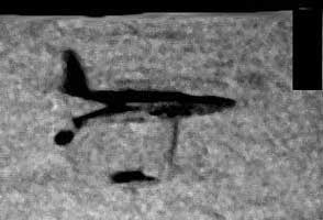 Sharc2 sidescan sonar low resolution (to maximize range) image of F-89c Scorpion lying on bottom of Lake Superior in Canadian territory. Wing missing.  Black rectangle below plane is not part of scene, but is graphic blackout of GPS and depth data. Sonar image © 2006 by Great Lakes Dive Co.