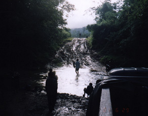 June 29, 2001 on rugged Route 9 from Xepon to Vilabouli, Laos. Photograph by Linda Moulton Howe.