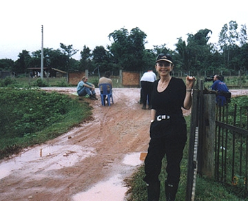 Tom Roberts, Explosive Ordnance Demolition Technician from Australia, sitting on shoulder of Route 9 in Xepon, Laos and telling us about the dangers of the road to Vilaburi (Vilabouli) and the Ho Chi Minh trail. Photograph by Lam Sae.