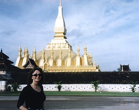Linda Moulton Howe in front of the Phrathatluang stupa in Vientiane, Laos on June 26, 2001. Photograph by Denise Blazek.