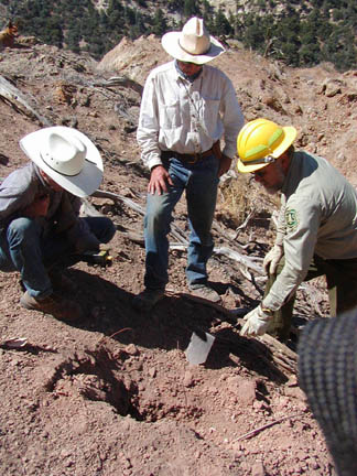 Left to right: Bob Mariner, USGS; Jim Boles, UC Santa Barbara; Allen King, USDAFS, sampling hot rock and measuring heat in 2005. Photograph courtesy Allen P. King.