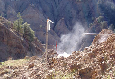 Gas sample tube on the wellhead. Maximum temperature measured was at 11.5 feet underground at 584 degrees F. Photograph courtesy Robert H. Mariner, USGS.