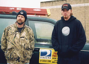On left, James Lund, owner Exodus Communications Co.; on right, his nephew Chris Dimukes. Photograph © 2005 by Tom Concert, South Side Sun.