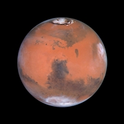 Mars, with its icy poles, photographed  by the Hubble Space Telescope.