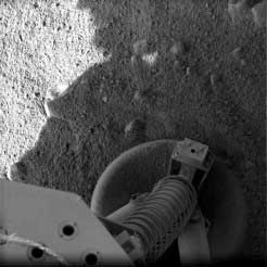 Phoenix Mars Lander footpad after landing at 4:53 p.m. Pacific, Sunday, May 25, 2008. Image credit: NASA; JPL; Cal Tech; University of Arizona.