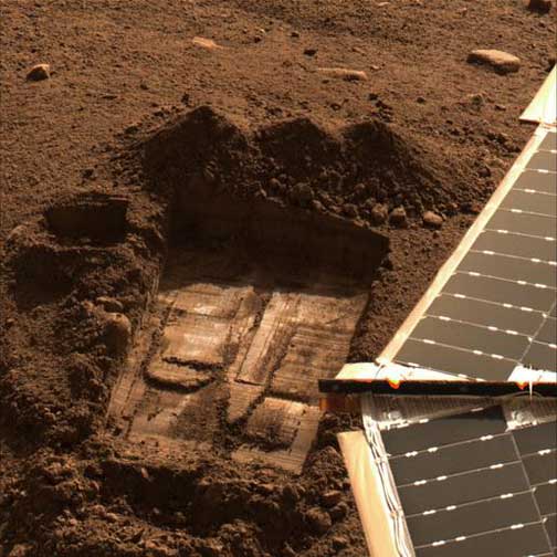 This image shows the trench informally called “Snow White” where the perchlorate has been detected. This image was acquired by NASA's Phoenix Mars Lander's Surface Stereo Imager on Sol 43, the 43rd Martian day after landing on July 8, 2008. Two samples were delivered to the Wet Chemistry Laboratory, which is part of Phoenix's Microscopy, Electrochemistry, and Conductivity Analyzer (MECA). The first sample was taken from the surface area just left of the trench and informally named “Rosy Red” It was delivered to the Wet Chemistry Laboratory on Sol 30 (June 25, 2008). The second sample, informally named “Sorceress” was taken from the center of the Snow White trench and delivered to the Wet Chemistry Laboratory on Sol 41 (July 6, 2008). Image credit: NASA/JPL-Caltech/Univ. of Arizona/Texas A&M.