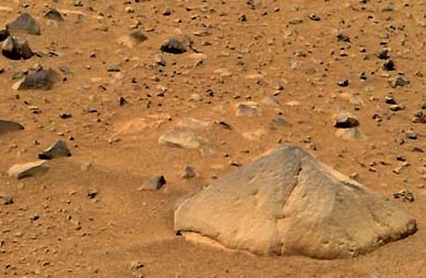 Big "Adirondack" rock that was Spirit's first test of its Rock Abrasion Tool (RAT). Turned out to be dark volcanic basalt under a layer of the reddish Martian dust. Image credit: NASA/JPL/Cornell.