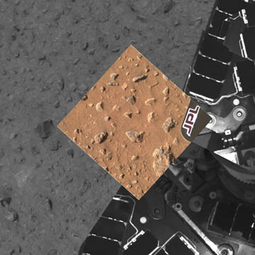 This image shows the patch of soil scientists examined at Gusev Crater just after Spirit rolled off the Columbia Memorial lander. Image credit: NASA/JPL.