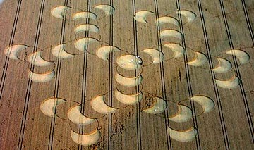 Large "molecule" formation reported August 10, 2003, spanning approximately 750 feet in a wheat field directly east of the July 6, 2003, 11-concentric-ring formation. Aerial photograph © 2003 by Mark Fussell, cropcircleconnector.